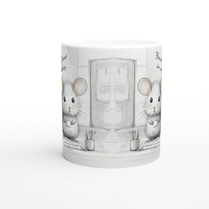 White ceramic mug with a pencil-drawn sketch of two cute mice beside a doorway in a simple room.