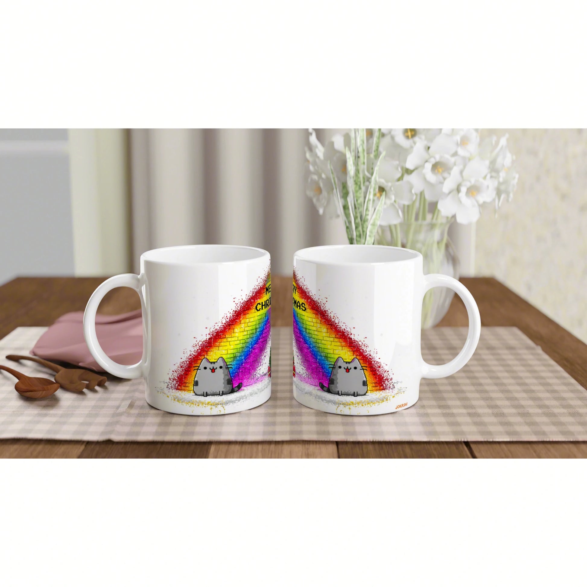 Two white ceramic mugs on a wooden table show a cartoon gray cat under a bright rainbow; a product mockup for an online shop.