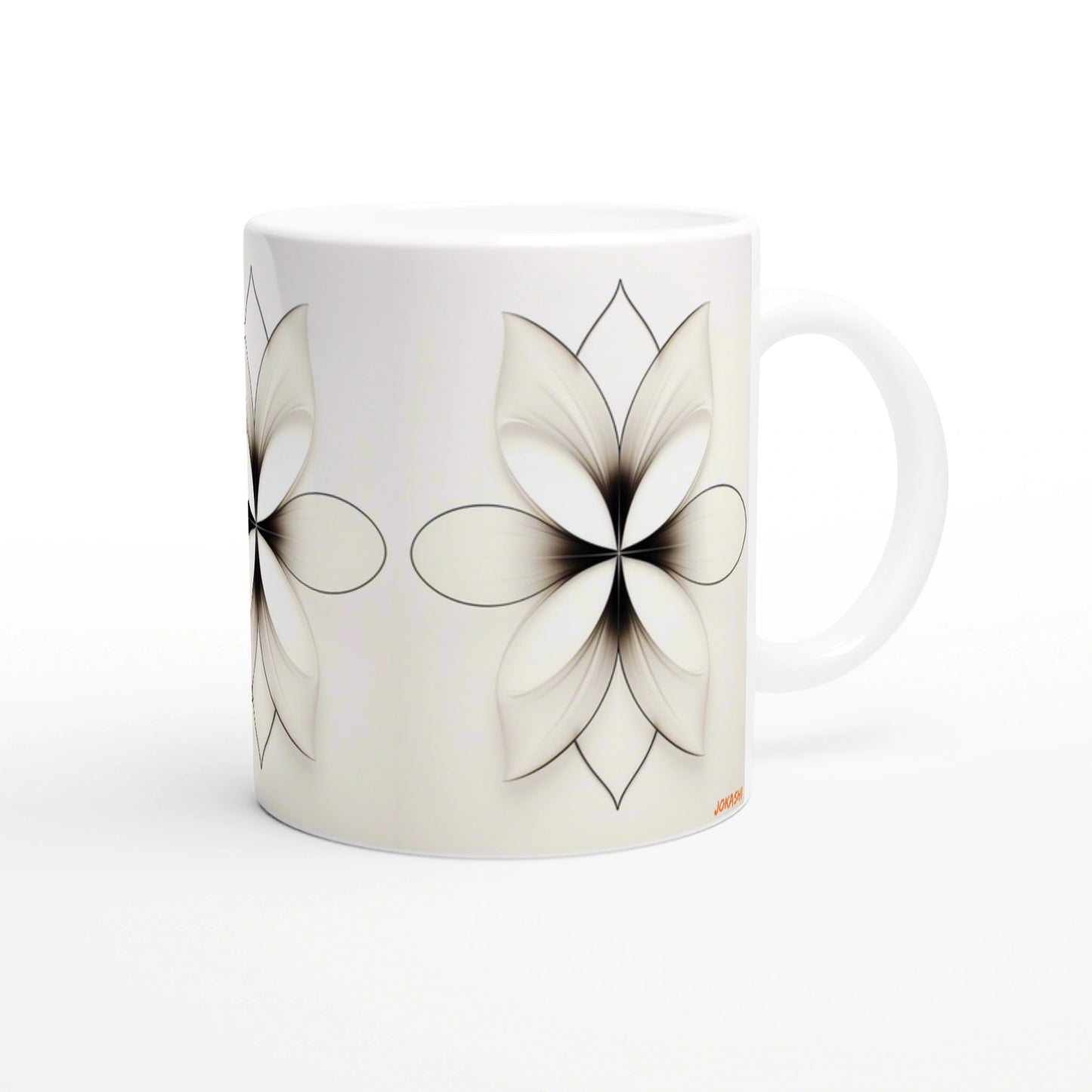 White ceramic mug with an abstract black line-art floral motif wrapping around the surface.