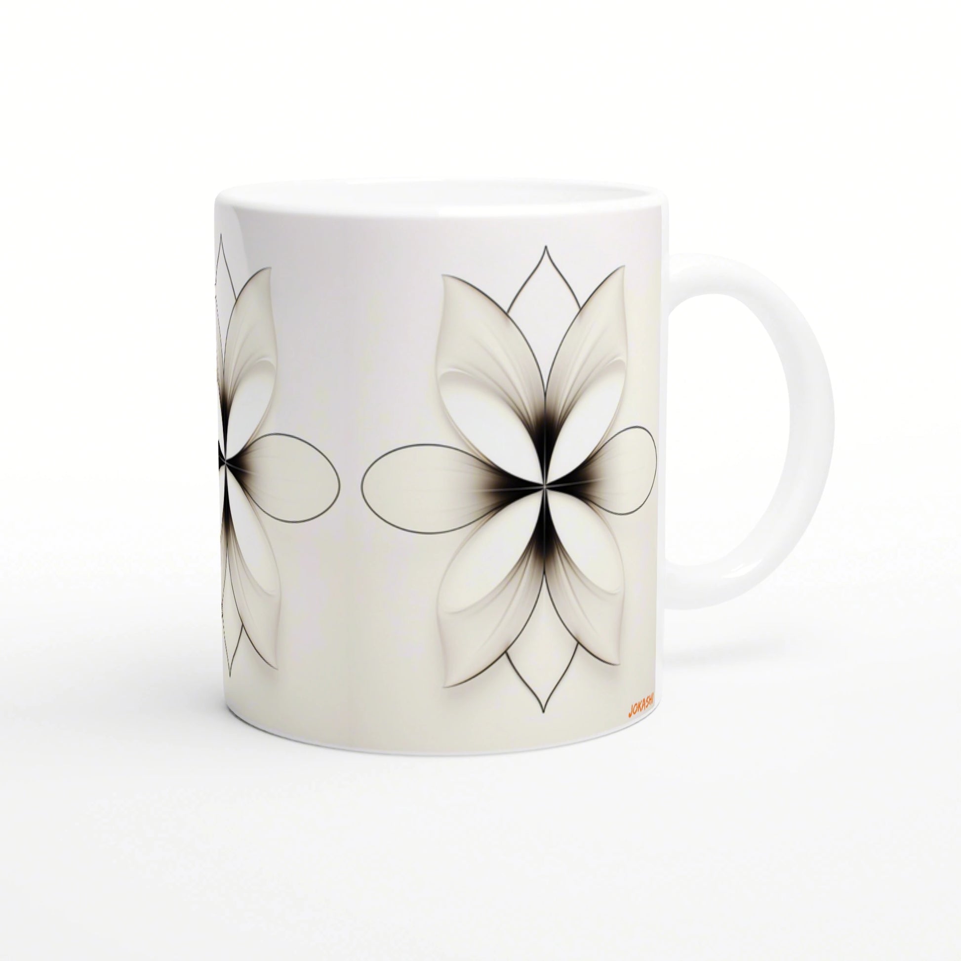 White ceramic mug with an abstract black line-art floral motif wrapping around the surface.