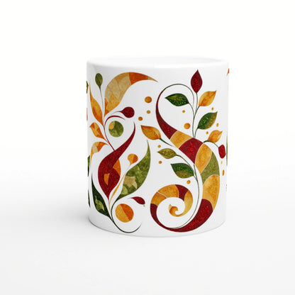 White ceramic mug featuring a vivid abstract botanical pattern of swirling vines and multicolored leaves in autumn hues.