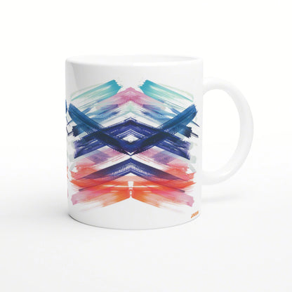 White ceramic mug with a vibrant abstract chevron brushstroke pattern in blue, teal, pink, purple, and orange.