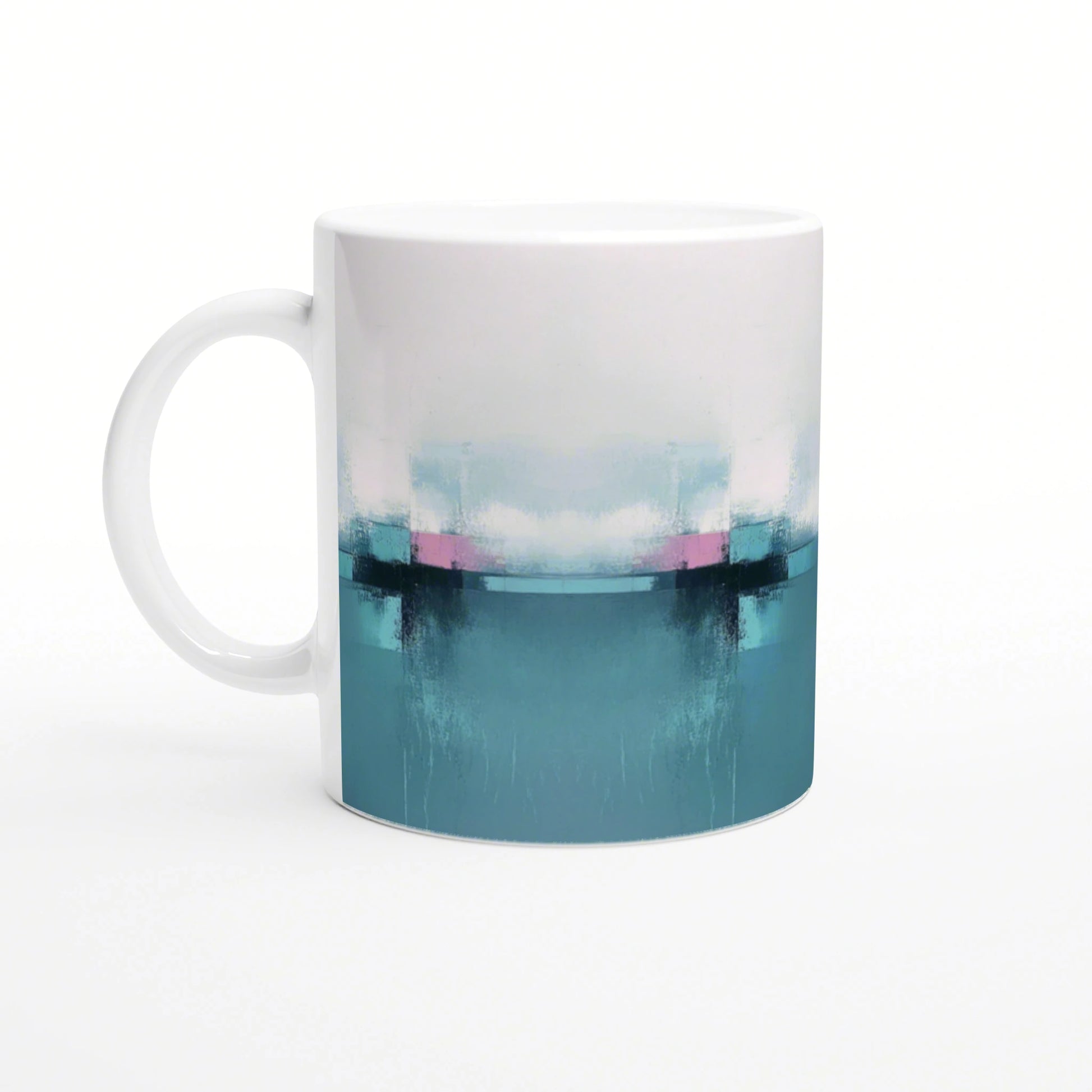 White ceramic mug with abstract gradient: teal bottom, pink stripe, and white-to-teal brushstrokes; product mockup.