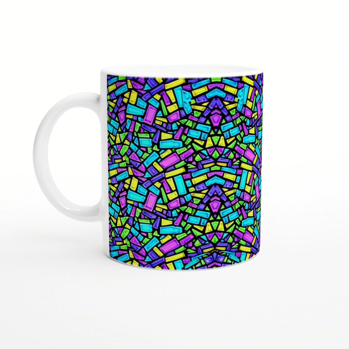 White ceramic mug featuring a vivid abstract mosaic of multicolored rectangles and shapes across the side.