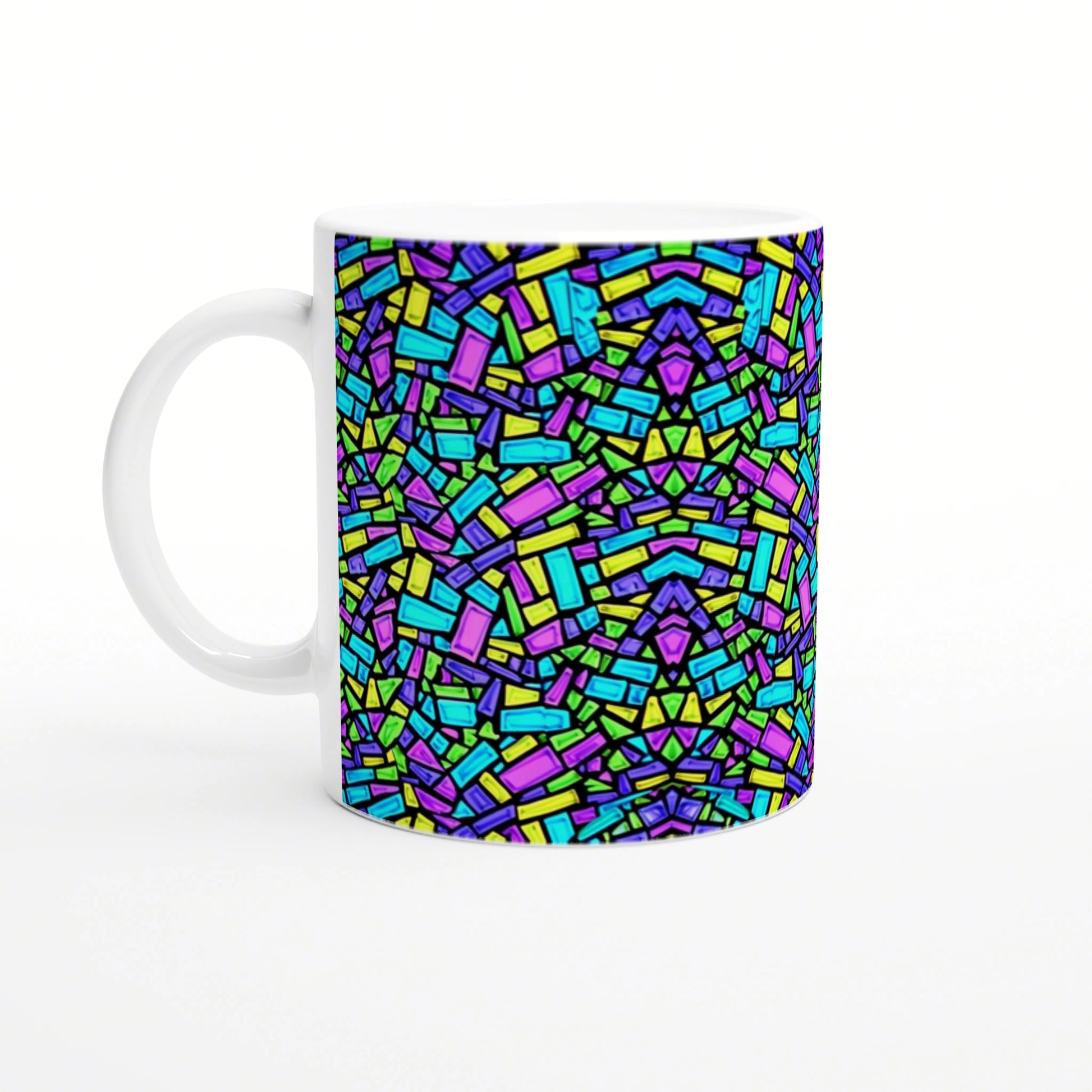 White ceramic mug featuring a vivid abstract mosaic of multicolored rectangles and shapes across the side.