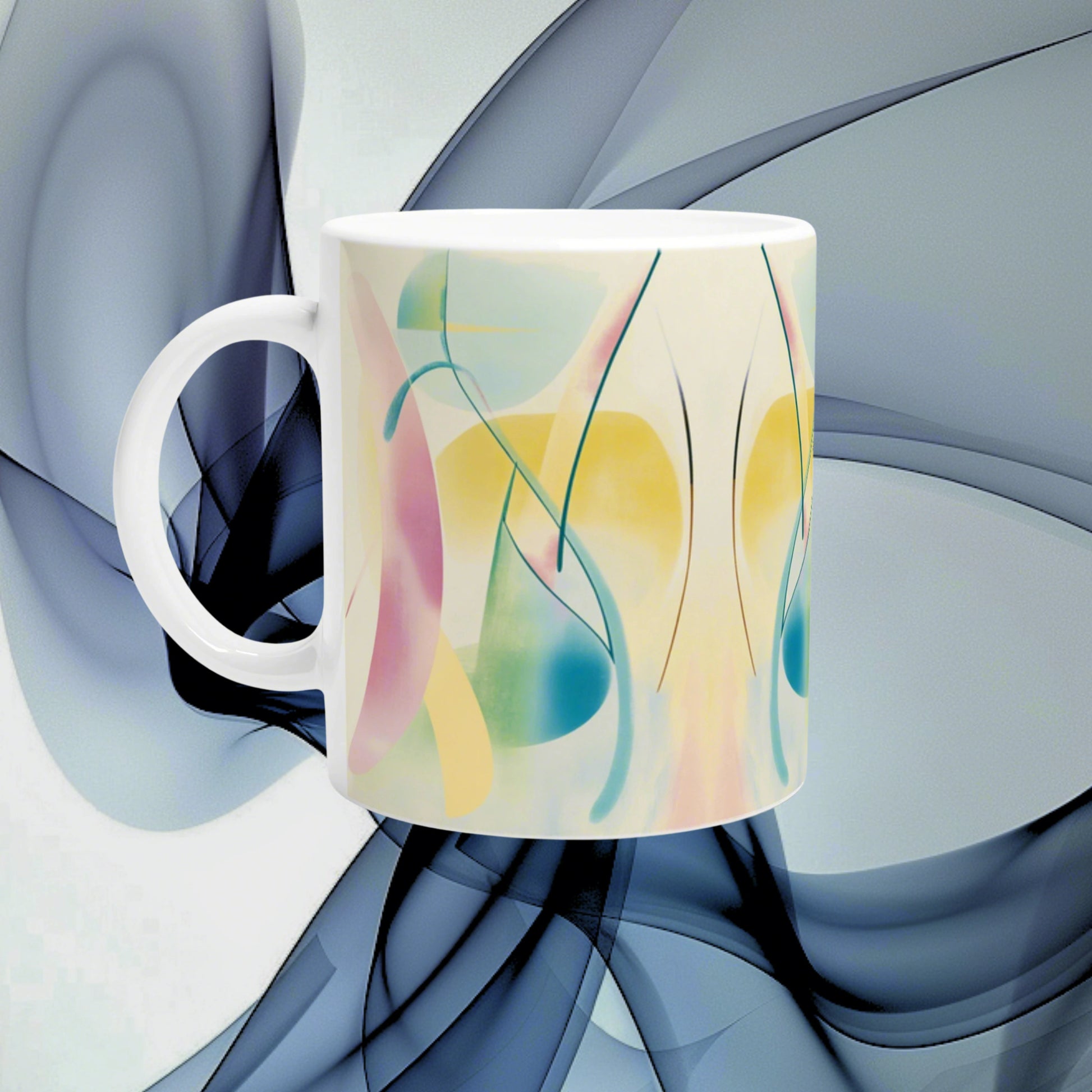 White ceramic mug featuring abstract pastel artwork with flowing lines; a product mockup on a muted blue background.