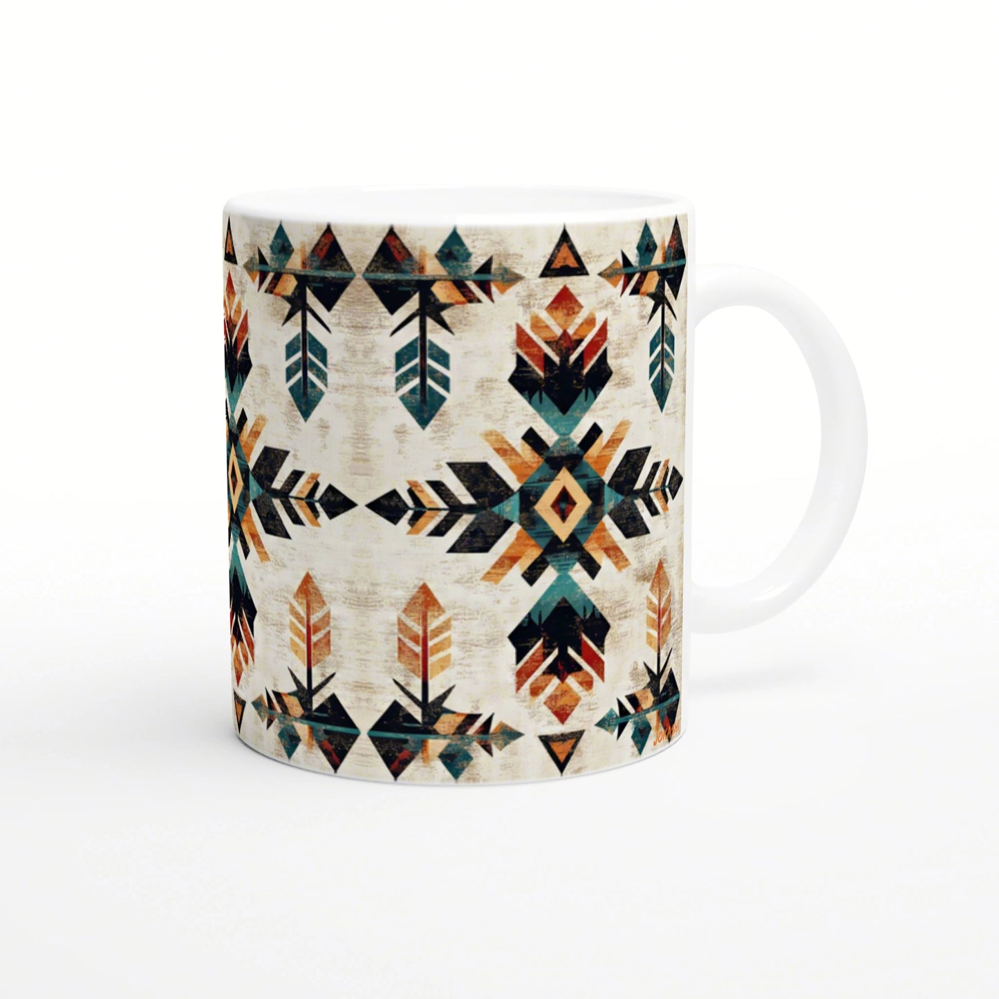 White ceramic mug with a distressed aztec-inspired geometric pattern in teal, orange, and black.