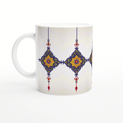 White ceramic mug mockup featuring a blue and gold ornamental lattice pattern with red accents.