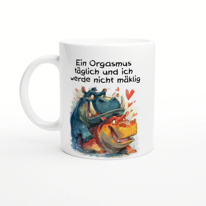 White ceramic mug with a colorful illustration of a blue and orange hippo hugging amid hearts; bold German slogan above.