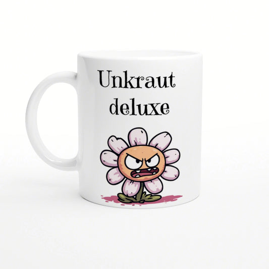 White ceramic mug featuring a cartoon angry flower with pink petals and the text Unkraut deluxe in black.