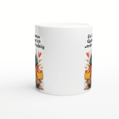 White ceramic mug mockup featuring a colorful cartoon character with hearts and partial German text along the sides.