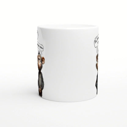 White ceramic mug mockup featuring a cartoon monkey with a speech bubble on the edge; blank center.