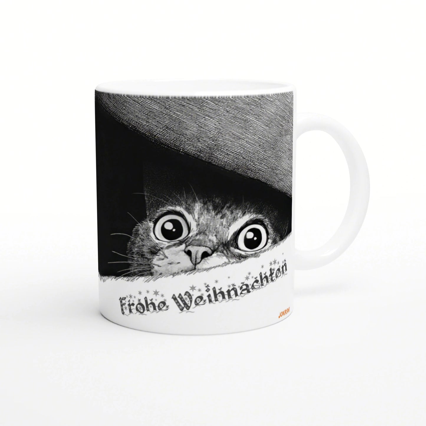 White ceramic mug with a black-and-white illustration of a wide-eyed cat peeking from under a hat and Frohe Weihnachten text.