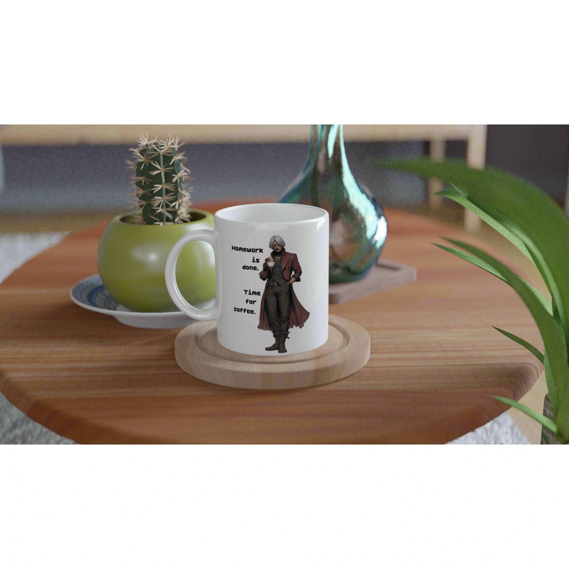 White ceramic mug on a wooden table featuring a cloaked figure and the caption 'Homework is done. Time for coffee.'