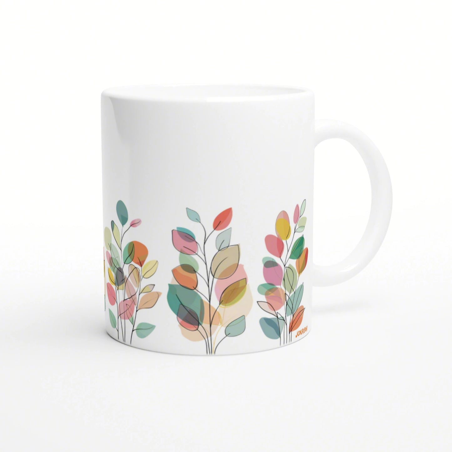 white ceramic mug with a colorful abstract leaf pattern along the bottom edge; product mockup.