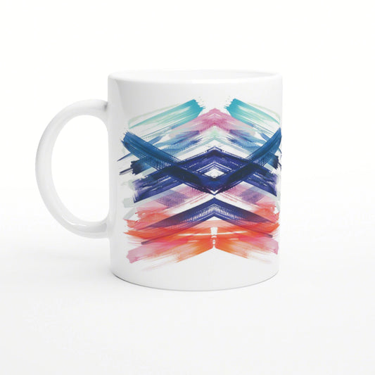 White ceramic mug with a colorful brush-stroke chevron pattern; abstract art design for a product mockup.