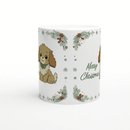 White ceramic mug featuring a cute brown puppy with a green bow, festive pine garlands and snowflakes with Merry Christmas text.