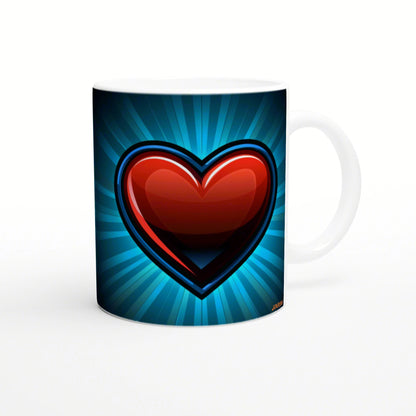 White ceramic mug featuring a glossy red heart on a blue radial burst background; a product mockup for cups and T-shirts.