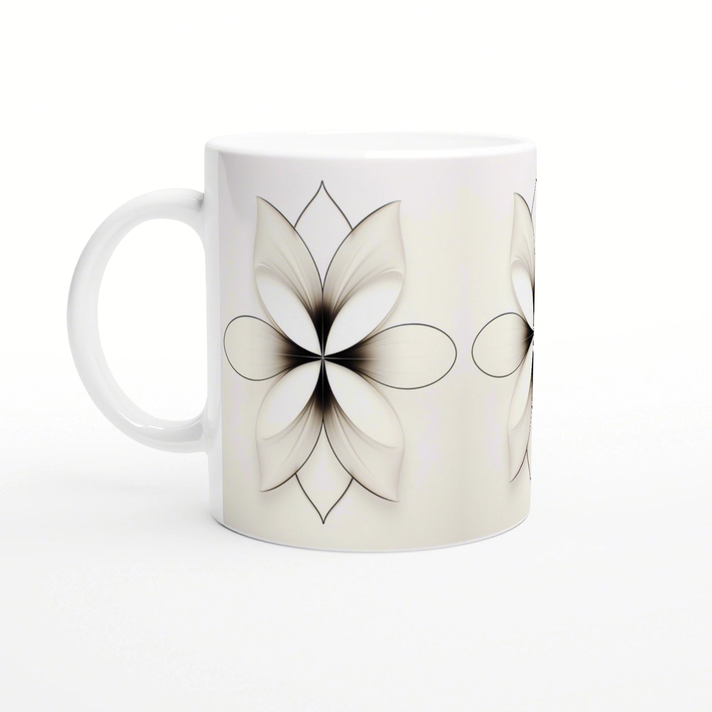 White ceramic mug mockup with a black-and-white floral pattern of large petals.