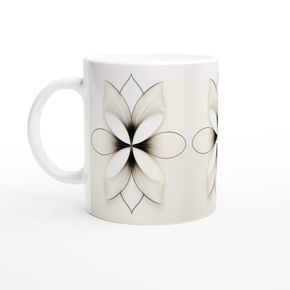 White ceramic mug mockup with a black-and-white floral pattern of large petals.