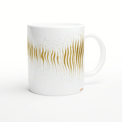 White ceramic mug with a vertical gold wavy stripe design and scattered gold specks.