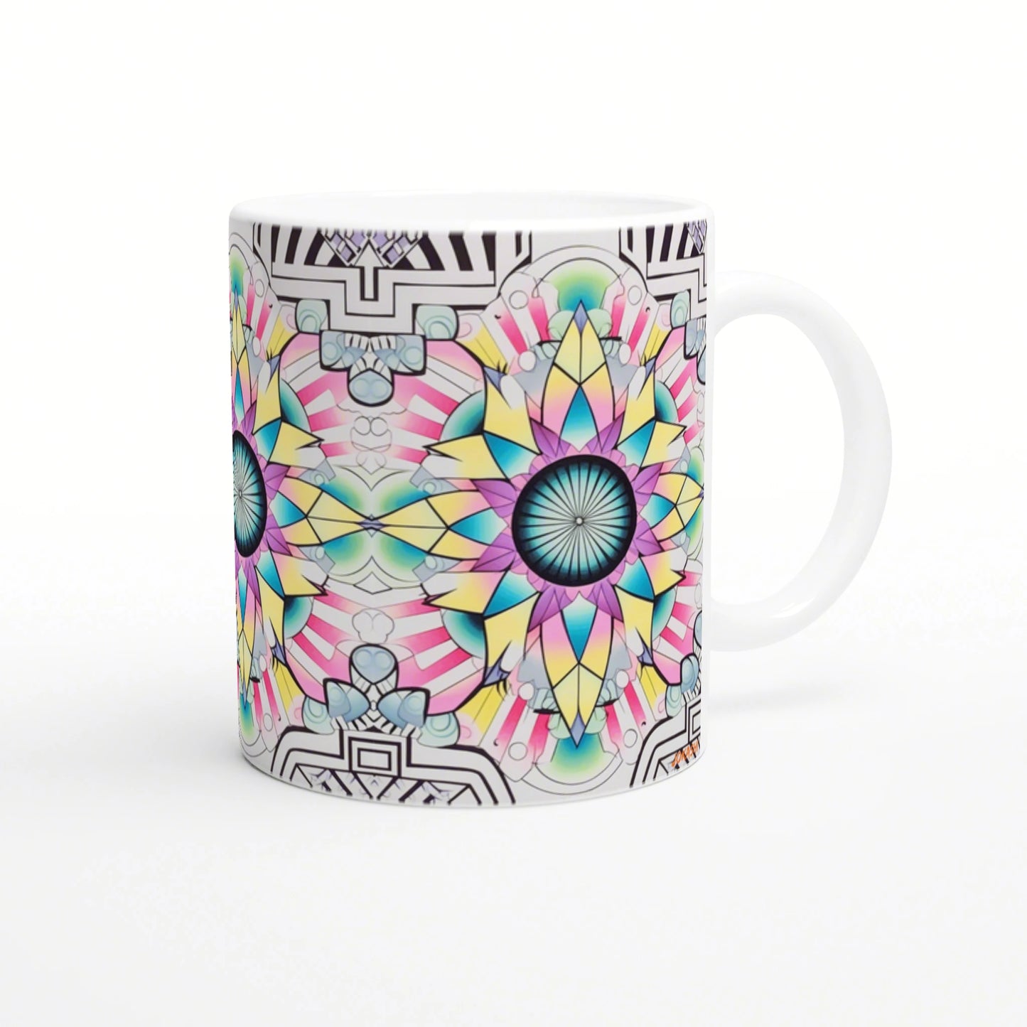 White ceramic mug wrapped in a vivid kaleidoscopic mandala design with neon petals and a blue center.