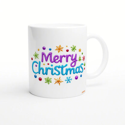 White ceramic mug displaying a colorful 'Merry Christmas' design in purple and blue, with snowflakes and dots.