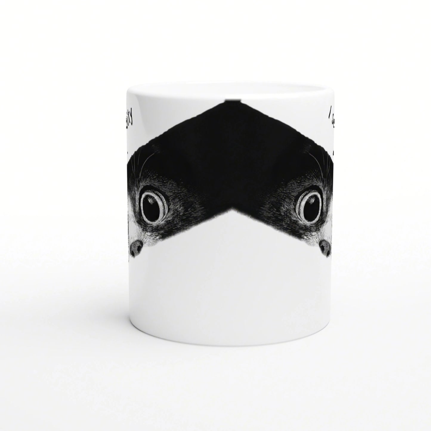 White ceramic mug featuring a mirrored black fish-head design forming a bold V-shape around the middle.