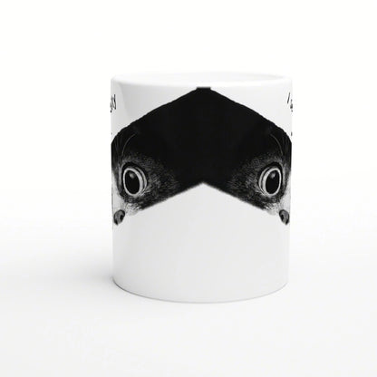 White ceramic mug featuring a mirrored black fish-head design forming a bold V-shape around the middle.
