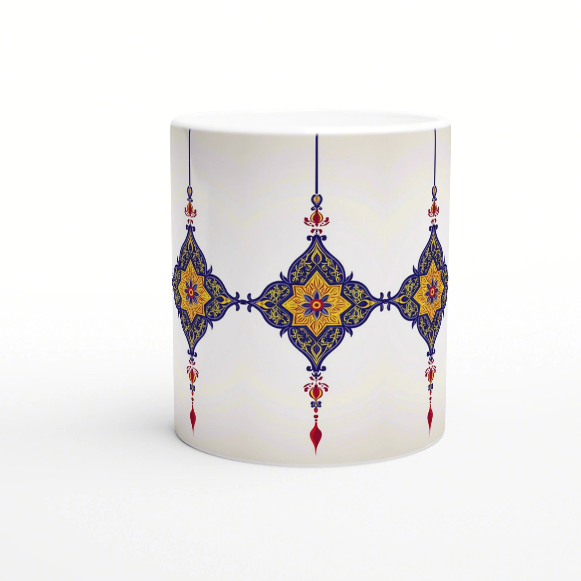 White ceramic mug mockup with repeating blue-and-gold ornate arabesque pattern and hanging pendant accents across the middle.