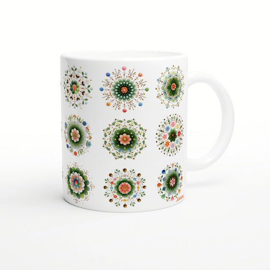 White ceramic mug mockup with multiple colorful mandala-style floral patterns around the body.