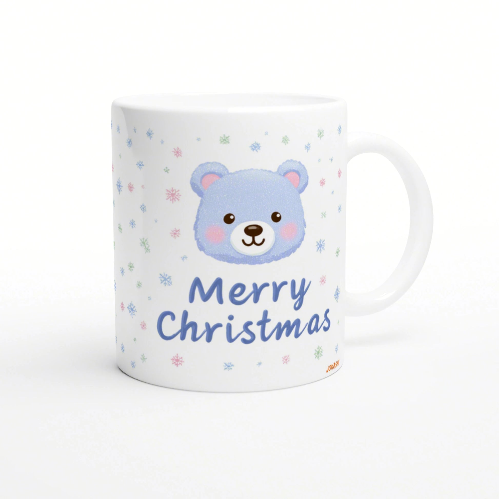White ceramic mug mockup featuring a cute blue bear face, pastel snowflakes, and Merry Christmas text.