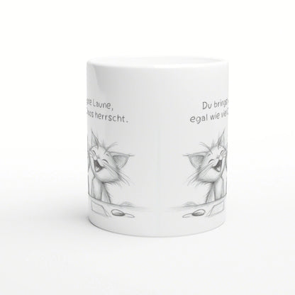 White ceramic mug mockup with a pencil-drawn laughing cat around the mug and partial German slogans.