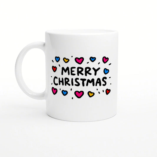 White ceramic mug mockup with 'Merry Christmas' text surrounded by colorful hearts on a white background.