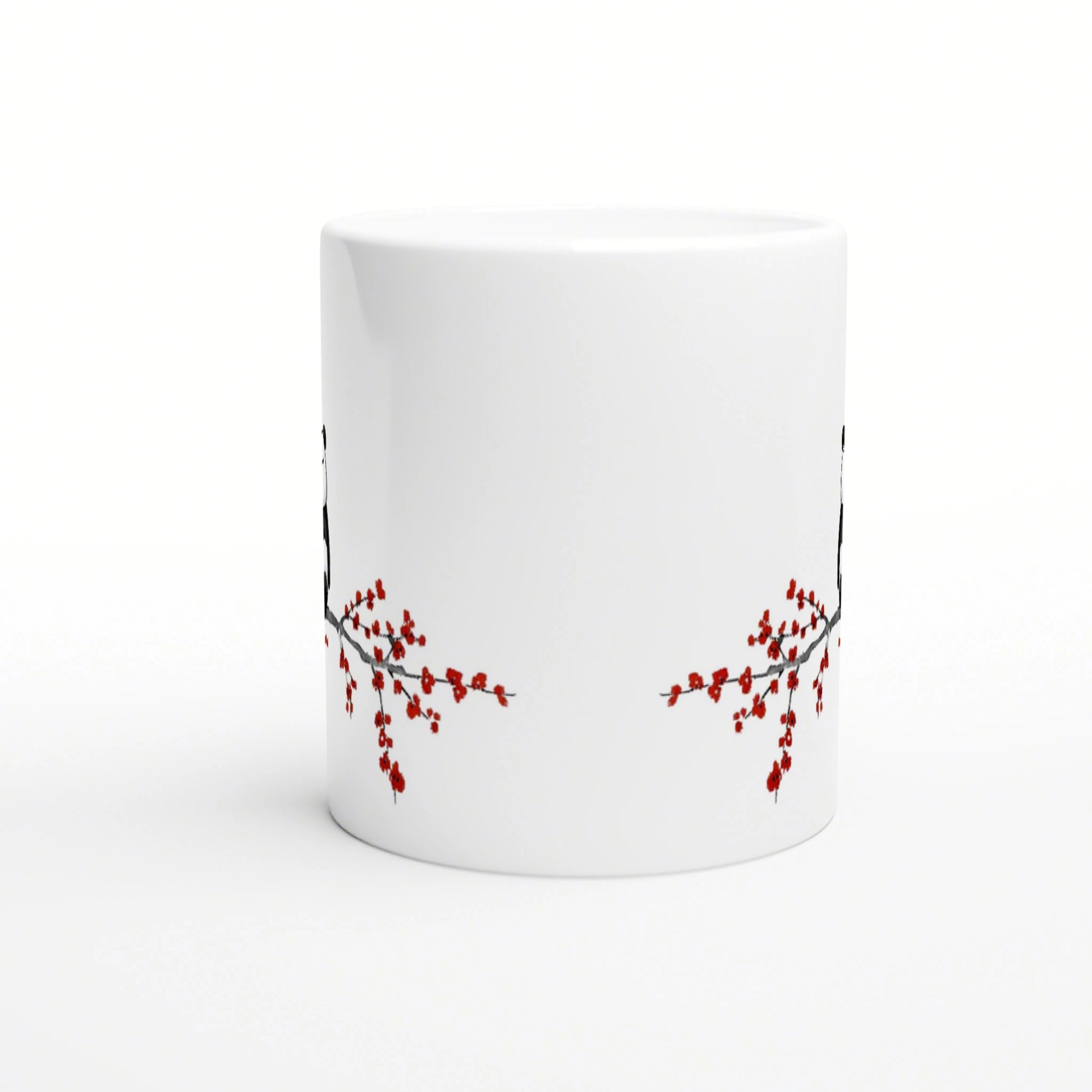 White ceramic mug mockup with red cherry blossom branches along the lower edge.