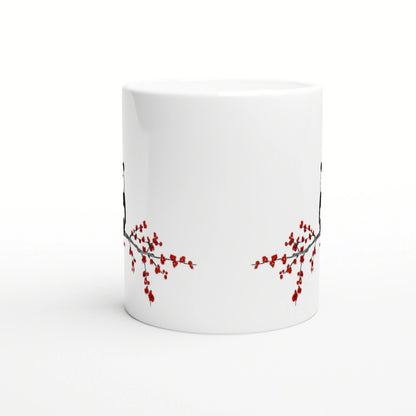 White ceramic mug mockup with red cherry blossom branches along the lower edge.