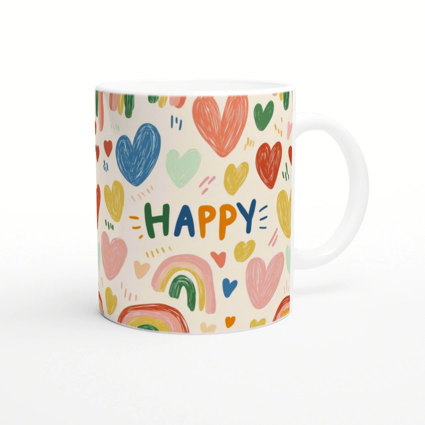 White ceramic mug with a playful pattern of multicolored hearts and rainbows, with the word HAPPY in bright letters.