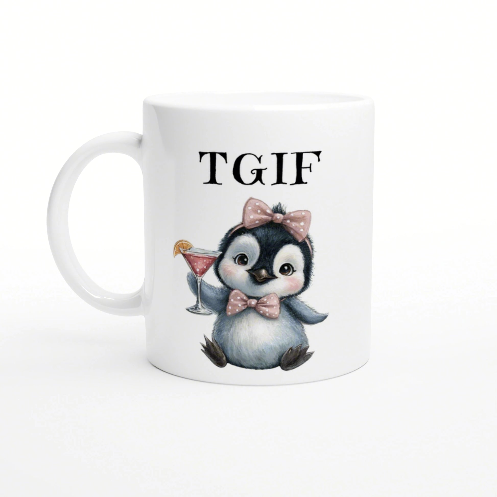 White ceramic mug with a cute penguin wearing pink bows, holding a cocktail, and TGIF text above.