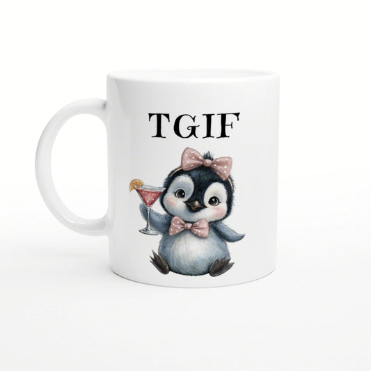 White ceramic mug with a cute penguin wearing pink bows, holding a cocktail, and TGIF text above.
