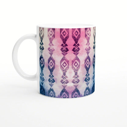 White ceramic mug with a pink-to-blue gradient and a repeating diamond geometric pattern; product mockup.