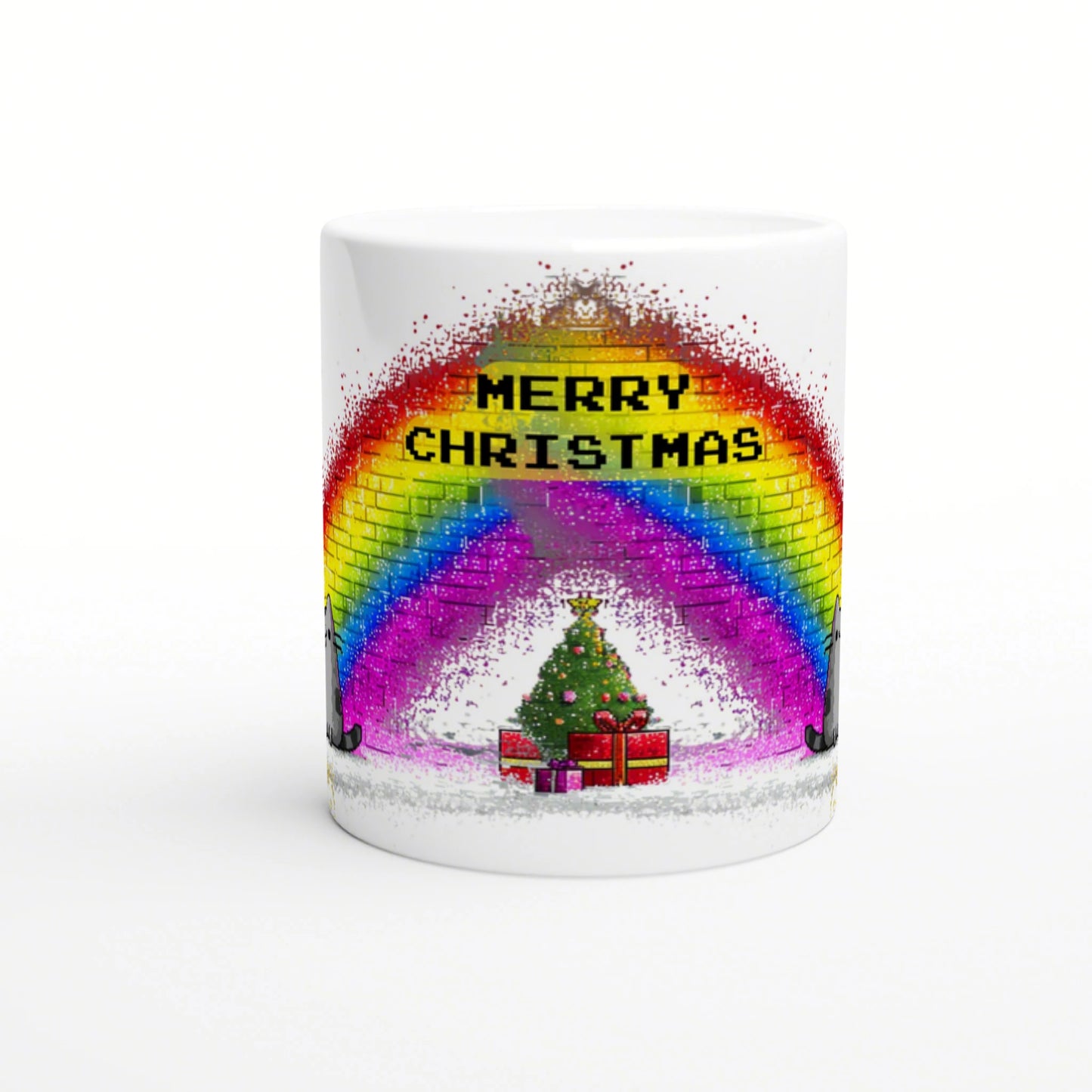 White ceramic mug with a pixel-style rainbow arc, 'MERRY CHRISTMAS' text, and a Christmas tree with gifts at the base.