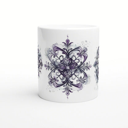 White ceramic mug wrapped in a large, symmetrical purple damask pattern with watercolor-style splashes; product mockup.