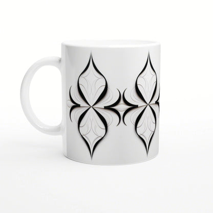 White ceramic mug featuring a repeating black geometric quatrefoil motif; product design mockup.