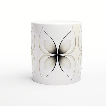 White ceramic mug featuring a repeating black symmetrical butterfly-like four-petal motif wrapping around.