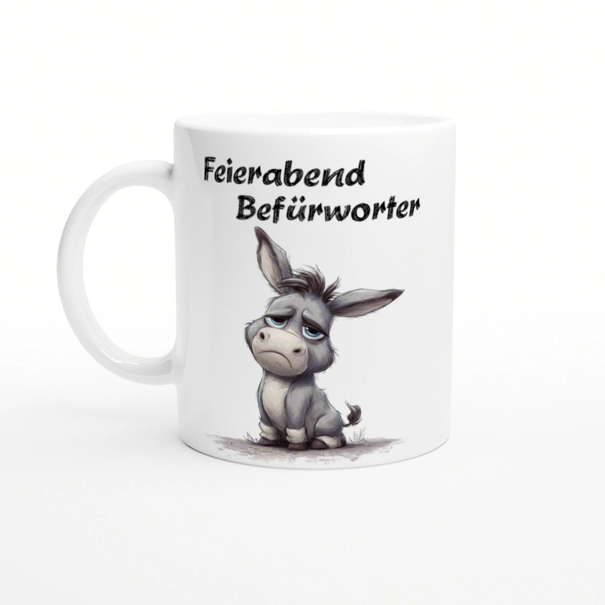 White ceramic mug mockup featuring a sleepy cartoon donkey and the German slogan Feierabend Befürworter in bold brush font.