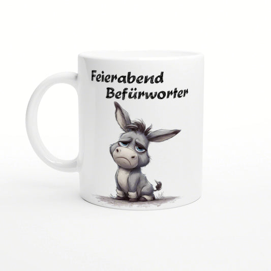 White ceramic mug mockup featuring a sleepy cartoon donkey and the German slogan Feierabend Befürworter in bold brush font.