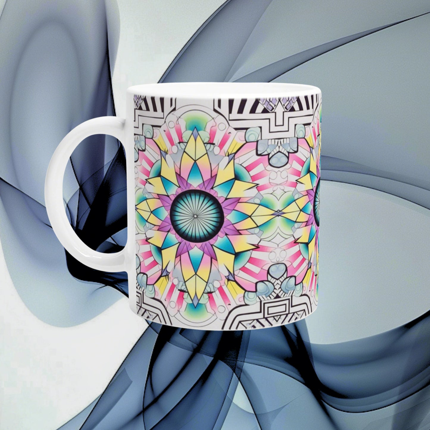 White ceramic mug featuring a vibrant kaleidoscopic mandala pattern; product mockup for colorful mugs in an online shop.