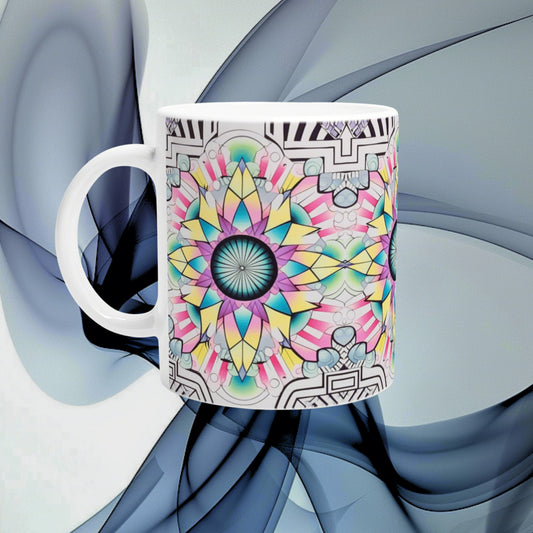White ceramic mug featuring a vibrant kaleidoscopic mandala pattern; product mockup for colorful mugs in an online shop.