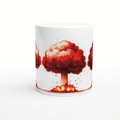 White ceramic mug featuring a wraparound red-orange mushroom-cloud tree illustration.