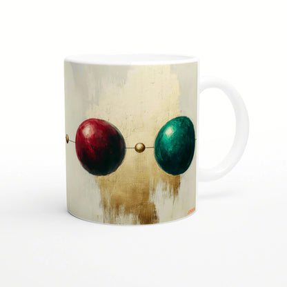 White mug with abstract art: red and teal spheres connected by a thin line on a textured beige background.